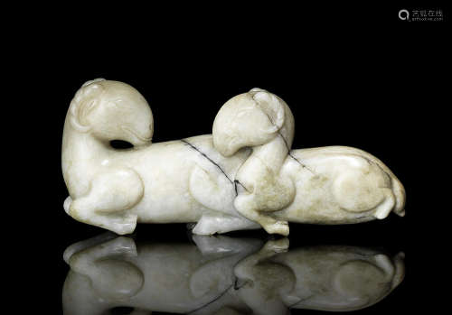 A 'chicken-bone' jade carving of two rams.  17th/18th century