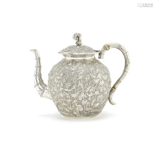 A Chinese export silver teapot.  Wang Hing stamped mark, late 19th/early 20th century