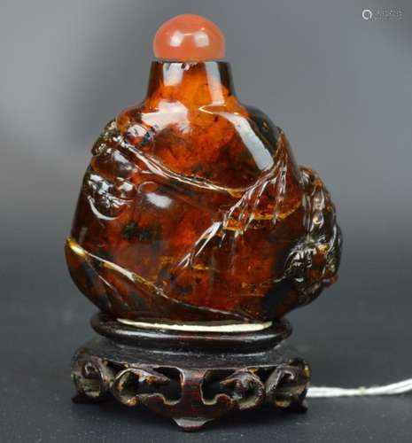 Chinese Carved Pebble-Shaped Amber Snuff Bottle