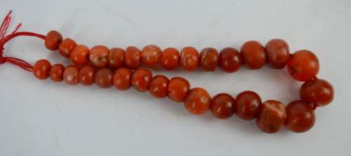 21 Old Carnelian Beads weighing 90 Grams