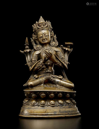 西藏 十四/十五世纪 铜错银文殊菩萨像