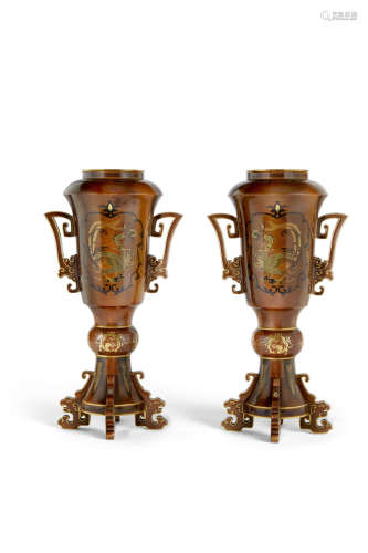 A pair of inlaid bronze slender handled vases By Chikaharu, Meiji era (1868-1912)