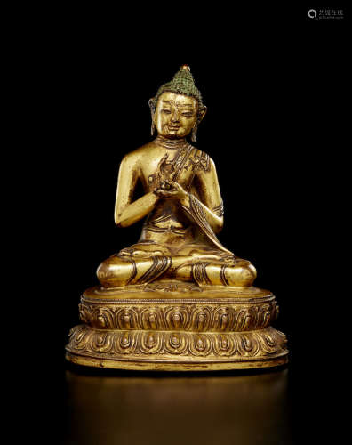 西藏 十五/十六世纪 铜鎏金佛坐像
