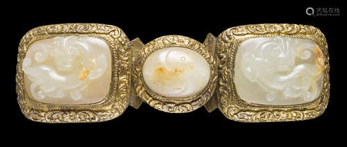 A three-section jade and gilt-metal belt buckle