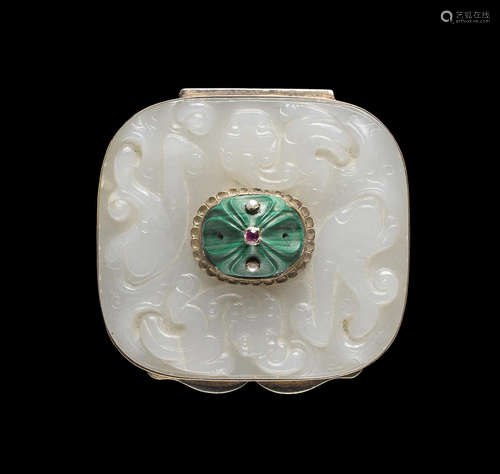 A white jade pendant mounted on a box