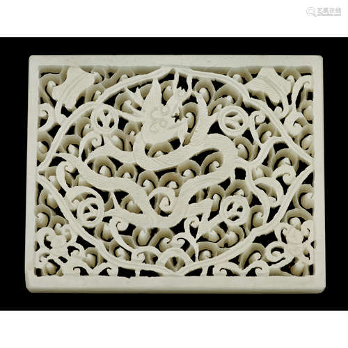 A Chinese white jade reticulated plaque with dragon, ming dynasty