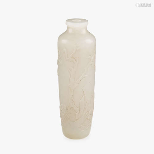 A Chinese white jade tapered snuff bottle, carved with prunus tree and scholar's rock, 19th century