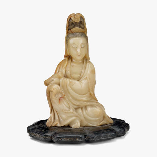 A fine Chinese soapstone carving of seated Wenshu Guanyin, 18th century