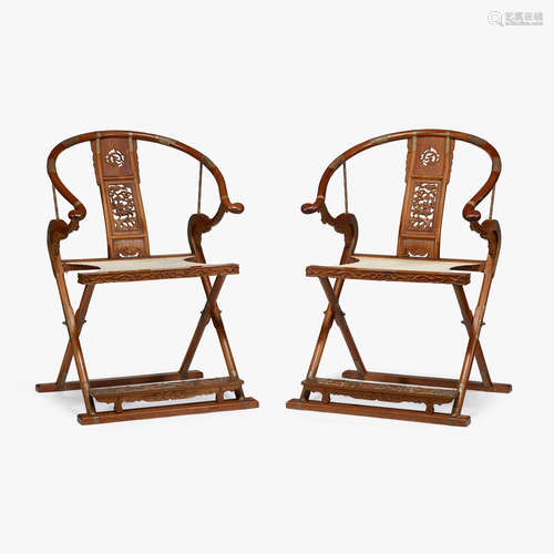 A pair of Chinese huanghuali folding chairs, 20th century