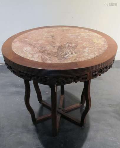 A Chinese circular pink marble-top hongmu center table, 19th/20th century