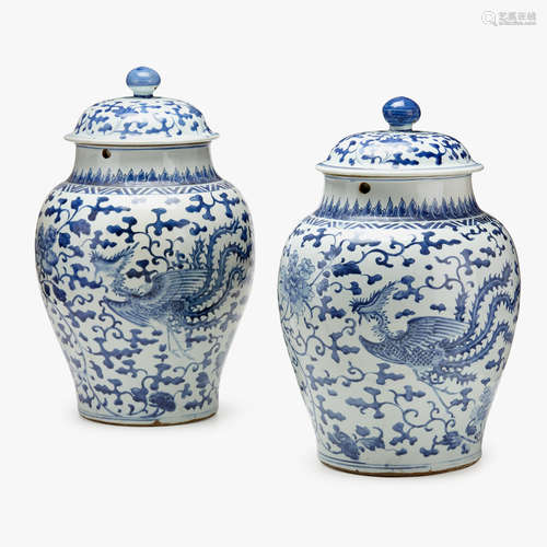 A pair of large Chinese blue and white porcelain 'phoenix' covered jars, 18th century