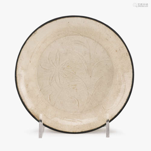 A Chinese Ding ware dish with incised floral design to interior, song dynasty