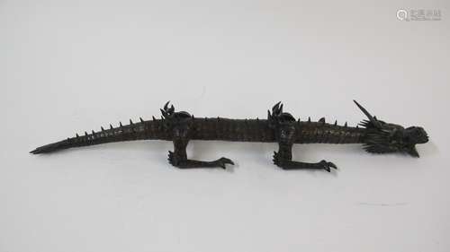 A Japanese articulated boxwood okimono of a dragon, meiji period