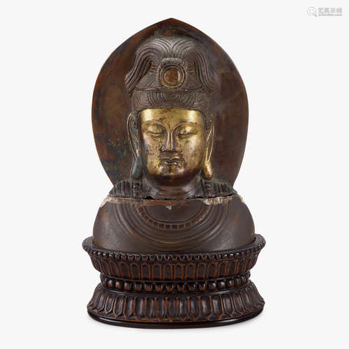 A Chinese gilt-bronze bust of Guanyin with mandorla, qing dynasty