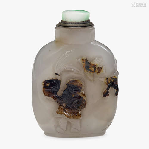 A Chinese silhouette agate snuff bottle, carved with boy to surface and birds verso, 19th century