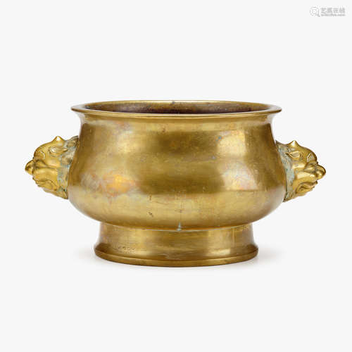 A large Chinese gilt-bronze censer with lion masks to sides, qing dynasty