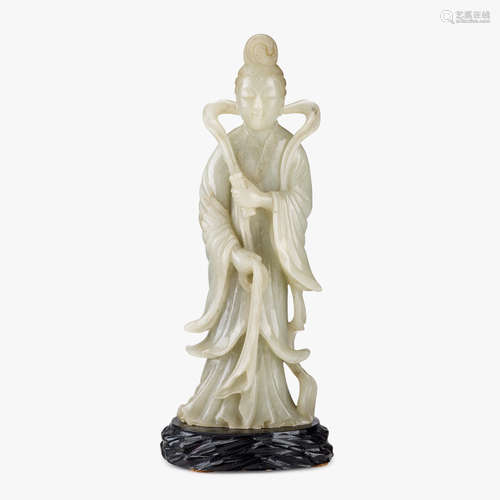 A Chinese carved celadon jade meiren with flowing scarf and scroll, 19th century