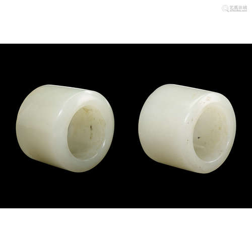 Two Chinese white jade unadorned archer's rings, qing dynasty