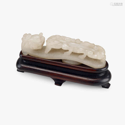 A Chinese white jade chilong garment hook, 18th century