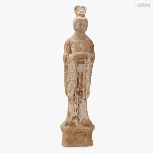 A Chinese terracotta earthenware figure of a maiden, sui dynasty