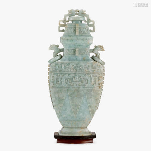 A large Chinese archaistic jadeite covered vase with twin phoenix-head ring handles and flanges, incised qianlong mark, republic period