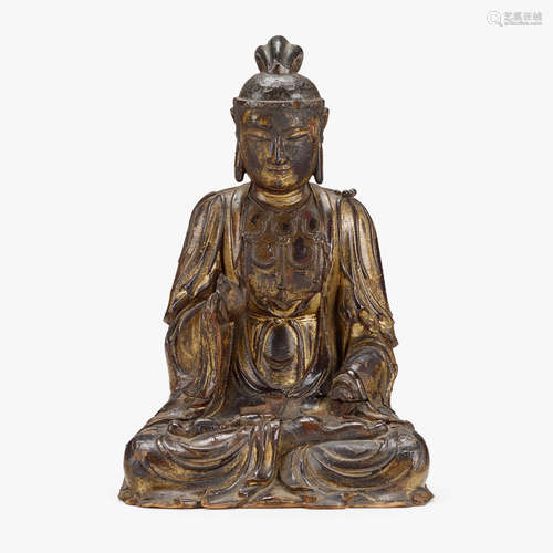 A Chinese gilt-lacquered wood figure of seated Guanyin, 17th/18th century