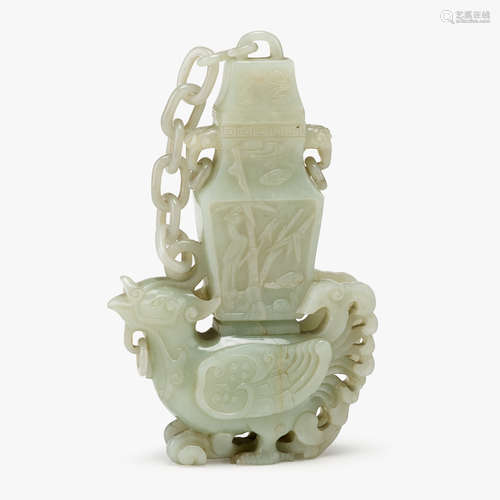 A Chinese carved celadon jade phoenix carrying a covered vase with chain to back, 19th century