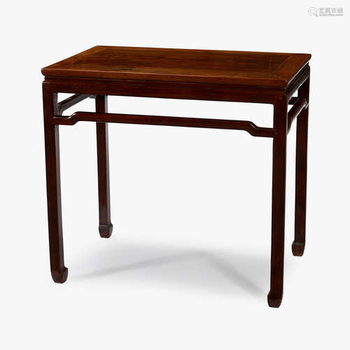 A Chinese huanghuali waisted corner-leg table, early 20th century