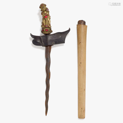 An Indonesian gilt and colored stone inset figural kris handle, 19th century