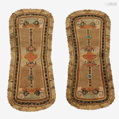 A pair of Sino-Tibetan pieced and trimmed silk brocade saddle covers, 19th century