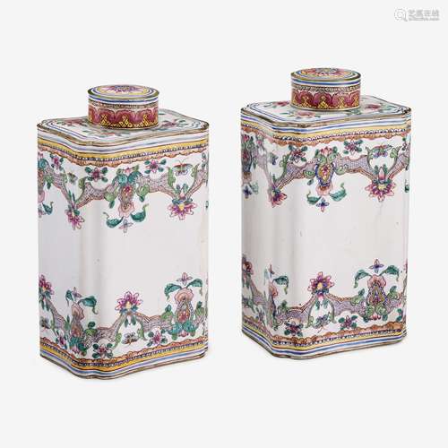 A pair of Chinese canton enamel curved rectangular tea caddies, 18th century