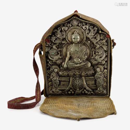 A large Tibetan 'Gau' mixed-metal travel shrine with woven cloth case, 19th century