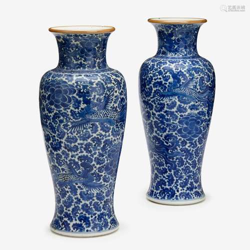 A pair of Chinese blue and white porcelain 'phoenix' baluster vases, kangxi period