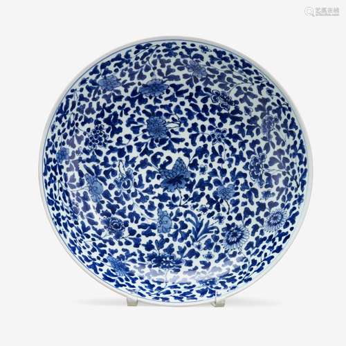 A Chinese blue and white porcelain floral charger, artemisia leaf mark, kangxi period