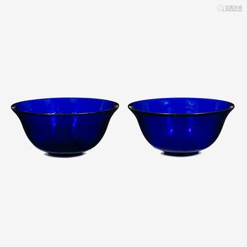 A pair of large Chinese colbalt blue glass bowls, qianlong four-character wheel-cut mark within a square and of the period