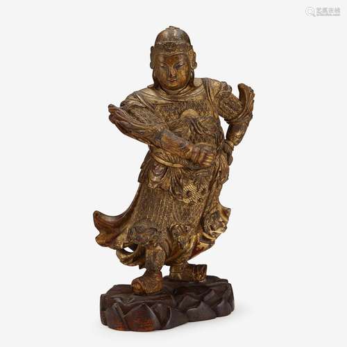 A Chinese gilt-lacquered wood standing figure of guardian bodhisattva Weituo, ming dynasty