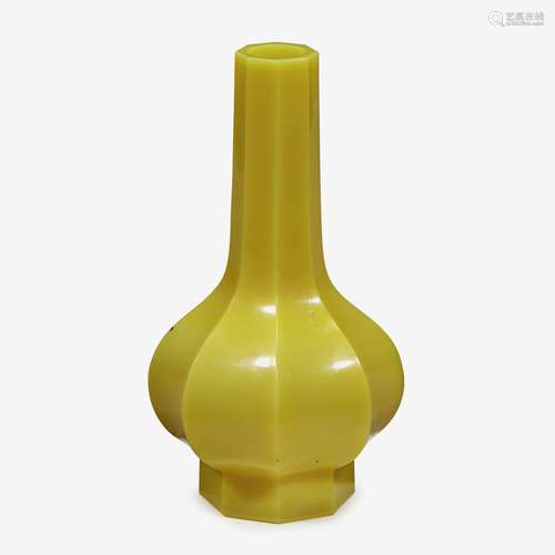 A fine Chinese yellow glass octagonal faceted bottle vase, qianlong four-character wheel-cut mark within a square and of the period