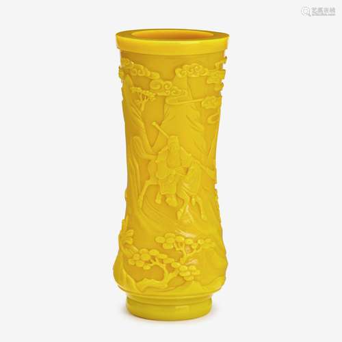 A Chinese yellow glass vase, carved with warrior scenes, qianlong four-character wheel-cut mark within a square and of the period