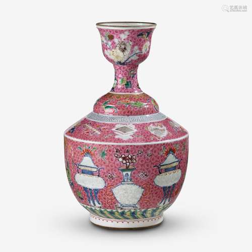 An unusual Chinese pink ground underglaze and famille rose enameled vase with cup-form rim, 18th century