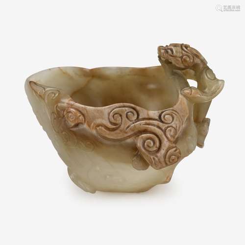 A Chinese celadon jade and russet chilong brush washer, ming dynasty