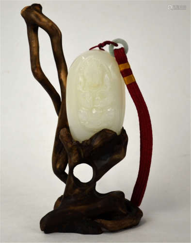 Chinese Carved White Jade Toggle on Wood Stand