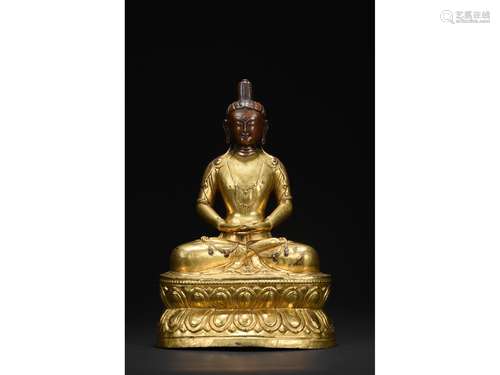 A GILT-BRONZE FIGURE OF AMITABHA