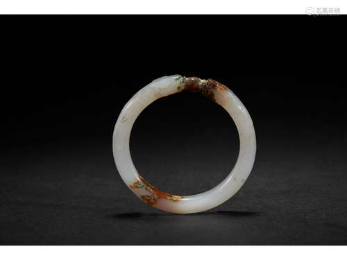 A WHITE JADE 'DRAGON' BANGLE