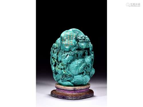 A TURQUOISE CARVED 'DEEP MOUNTAIN' BOULDER