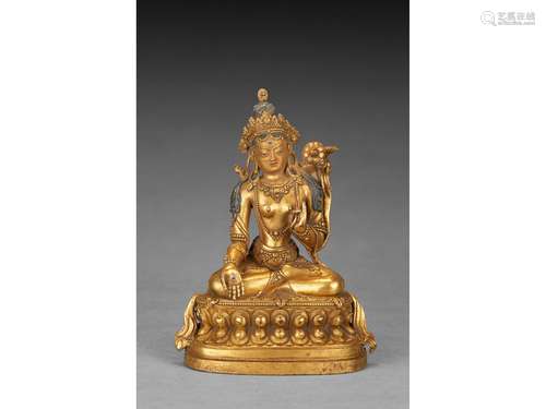 A GILT-BRONZE FIGURE OF WHITE TARA