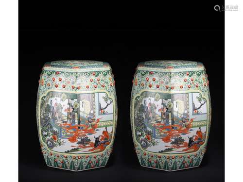 A PAIR OF FAMILLE ROSE 'FIGURES' STOOLS