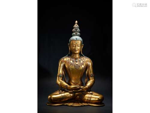 AN IMPRESSIVE GILT-BRONZE FIGURE OF AMITAYUS