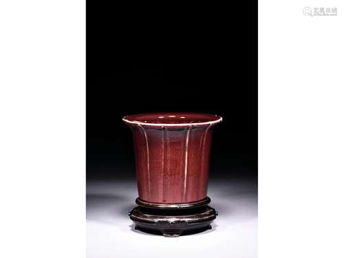 A RED GLAZED JARDINIERE