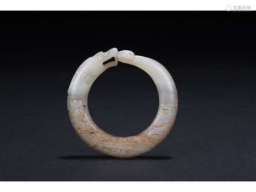 A WHITE JADE DRAGON BANGLE