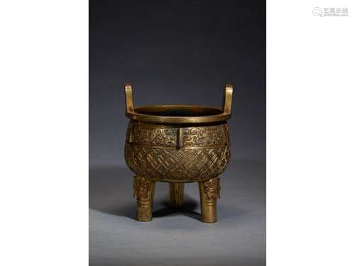 A GILT-BRONZE 'TAOTIE' TRIPOD CENSER